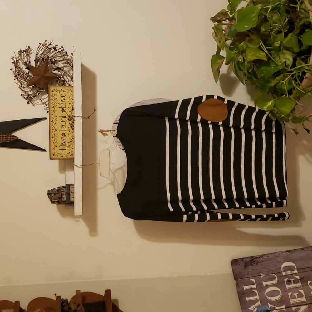 Black and white shirt with brown on elbows